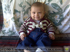 Aakash in the Mandarin Baby sweater